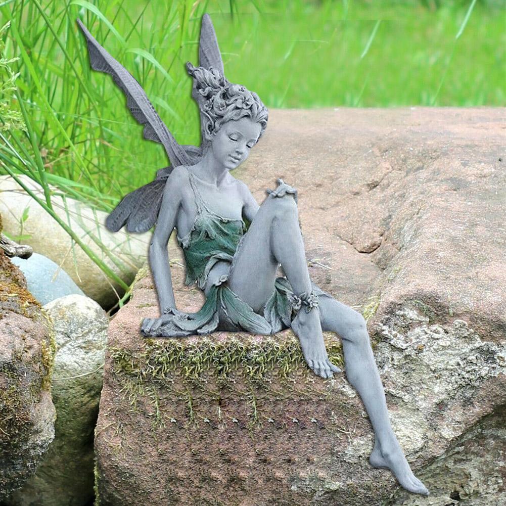 tudor and turek sitting fairy statue