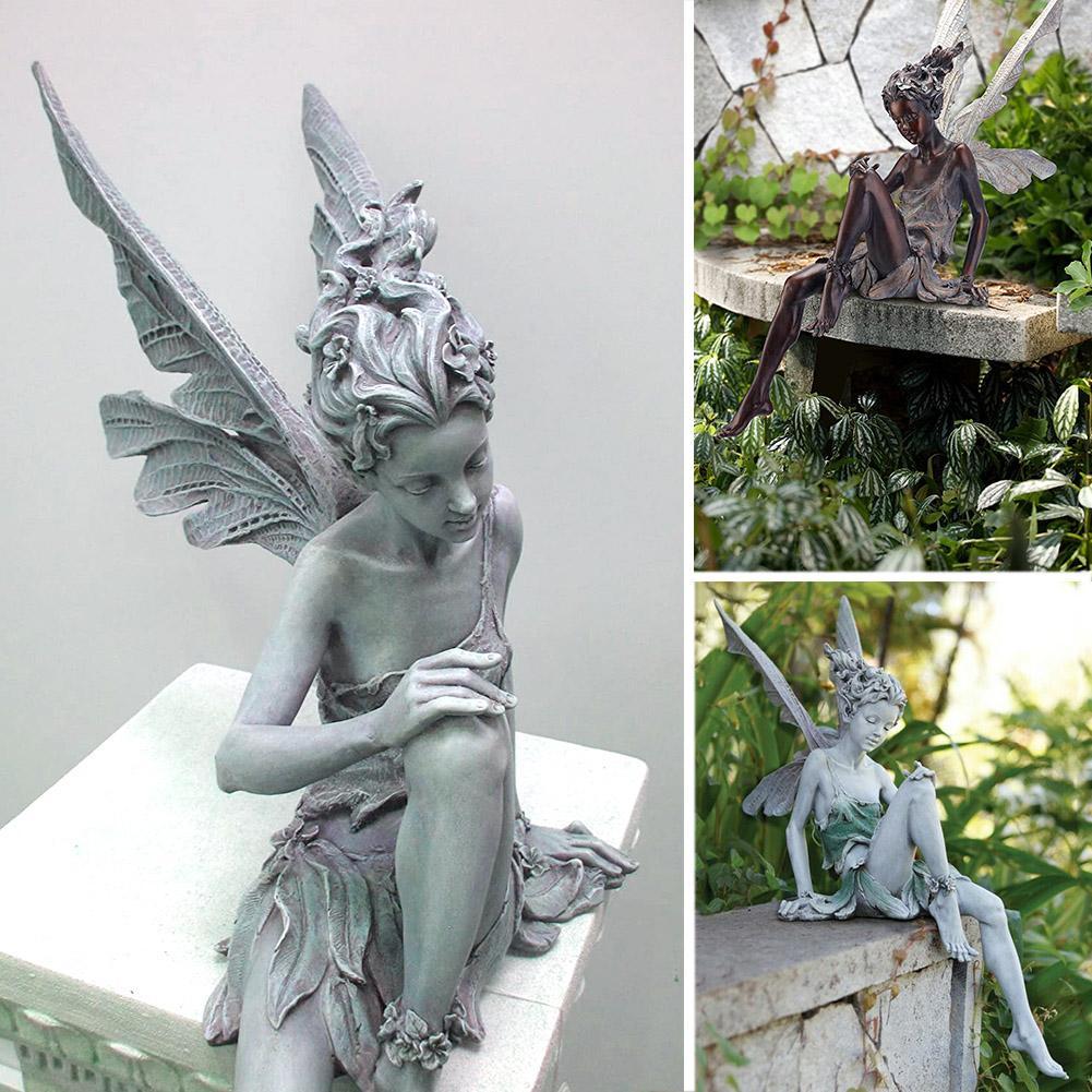 tudor and turek sitting fairy statue