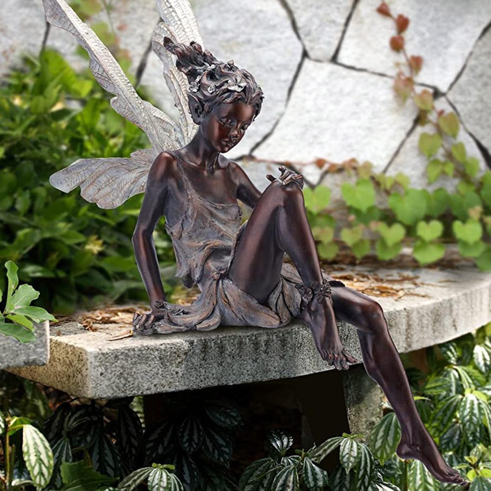 tudor and turek sitting fairy statue