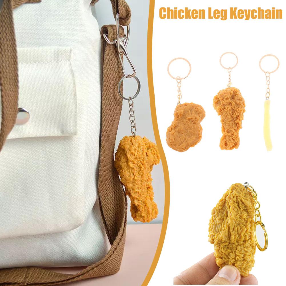 thumbnail image 4 of Wartleves Llavero de nuggets de pollo pulunto, llavero de comida, llavero de simulación de nuggets de pollo frito, llavero de ala para bolso de mano, 4 of 7