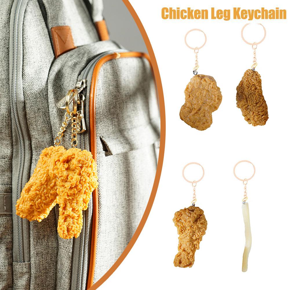 thumbnail image 3 of Wartleves Llavero de nuggets de pollo pulunto, llavero de comida, llavero de simulación de nuggets de pollo frito, llavero de ala para bolso de mano, 3 of 7