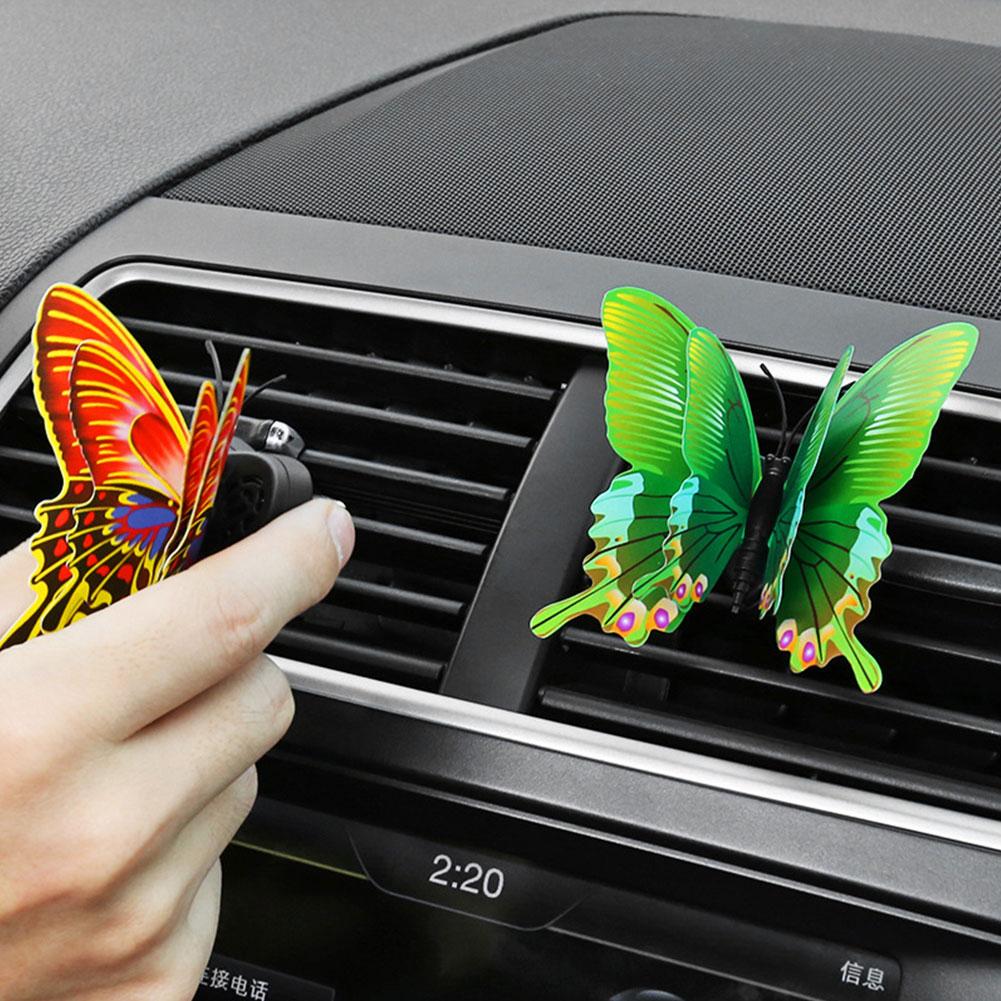 thumbnail image 5 of Ruifaya Clip de perfume con salida de aire de mariposa dinámica para consola central de automóvil, 5 of 7