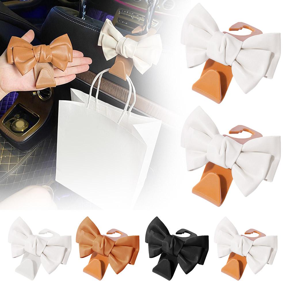 thumbnail image 2 of Ruifaya Ganchos para asiento de coche con forma de lazo, bonito gancho para reposacabezas de asiento de coche con forma de lazo, paquete de 2, organizador de almacenamiento con forma de lazo, gancho, 2 of 7